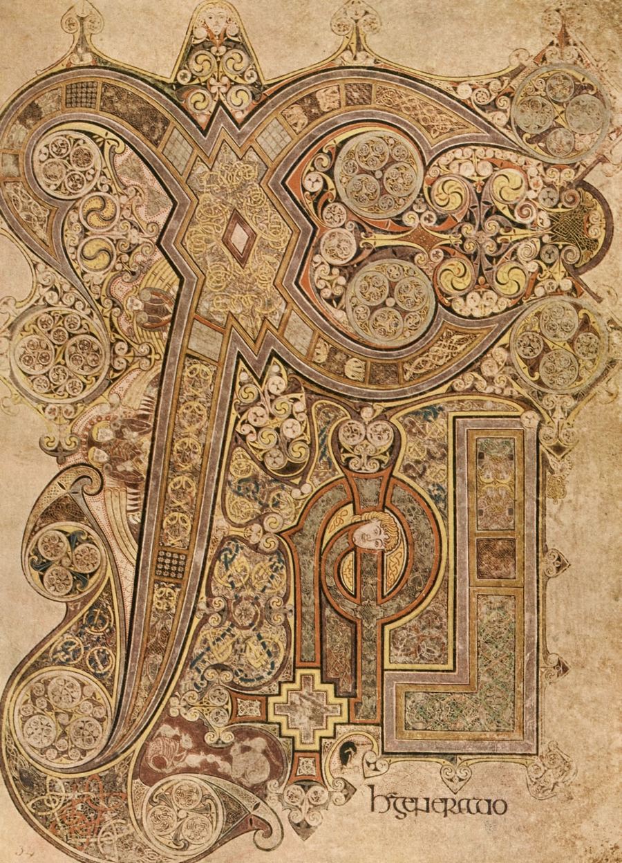 The Chi Rho page of the Book of Kells: a giant illuminated monogram packed with spirals, knotwork and tiny figures, shown in warm amber tones